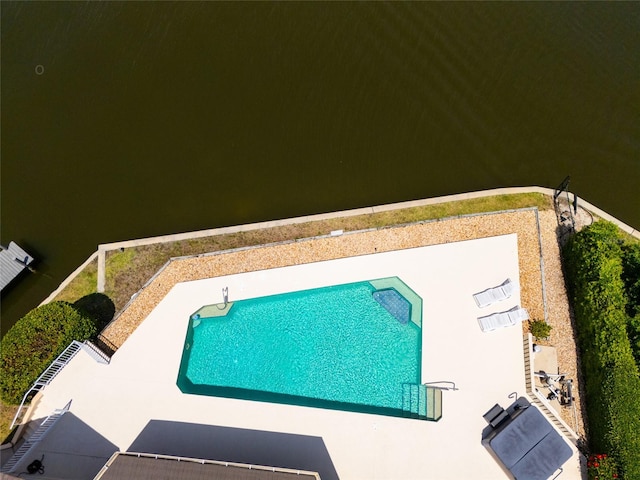 outdoor pool with a patio
