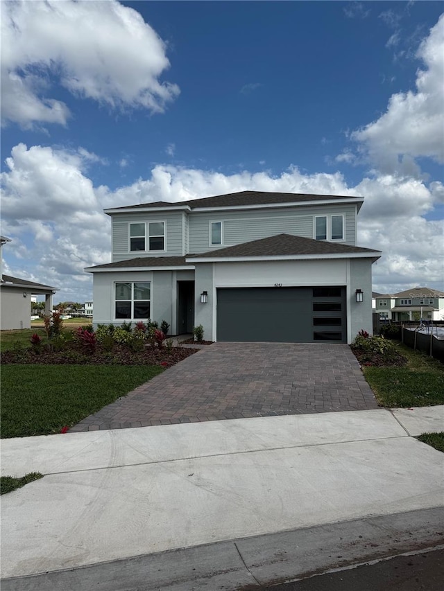 8243 Fenton St, Orlando, FL 32836 - traditional-style home with stucco siding and decorative driveway