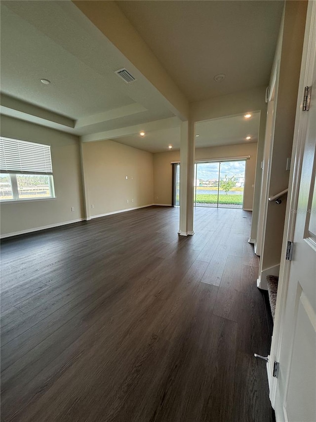 8243 Fenton St, Orlando, FL 32836 - spare room with dark wood-type flooring, baseboards, and visible vents