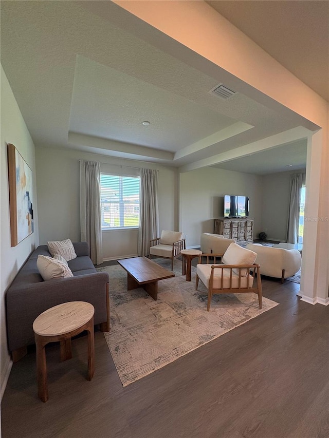 8243 Fenton St, Orlando, FL 32836 - living room with wood finished floors and a tray ceiling