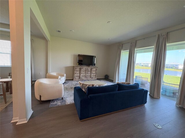 8243 Fenton St, Orlando, FL 32836 - living area with wood finished floors and a textured ceiling