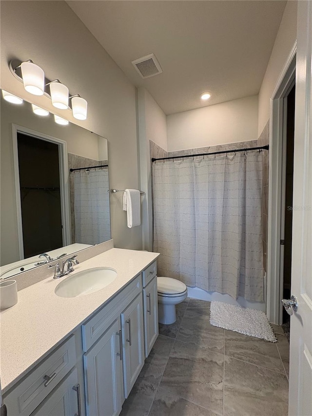 8243 Fenton St, Orlando, FL 32836 - bathroom with toilet and vanity