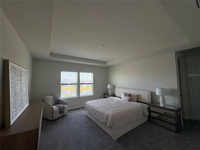 8243 Fenton St, Orlando, FL 32836 - bedroom featuring carpet floors and a raised ceiling