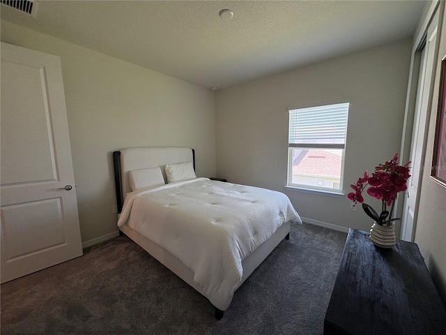 8243 Fenton St, Orlando, FL 32836 - bedroom with dark carpet
