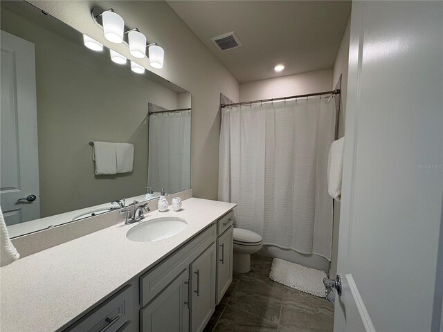 8243 Fenton St, Orlando, FL 32836 - full bathroom featuring toilet and vanity