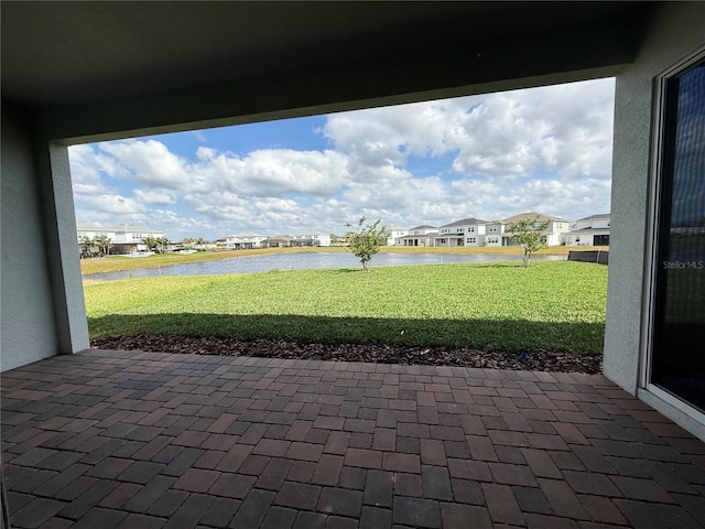 8243 Fenton St, Orlando, FL 32836 - view of patio / terrace with a water view and a residential view