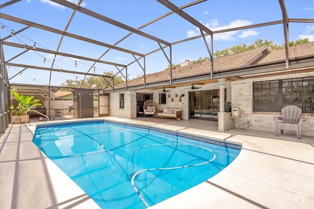 1558 Regal Oak Dr, Kissimmee, FL 34744 - pool featuring glass enclosure, a patio, and a ceiling fan
