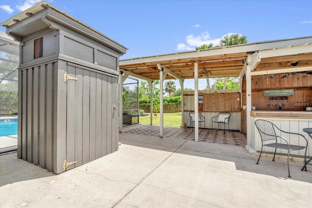 1558 Regal Oak Dr, Kissimmee, FL 34744 - view of patio / terrace featuring outdoor dry bar and an outdoor pool