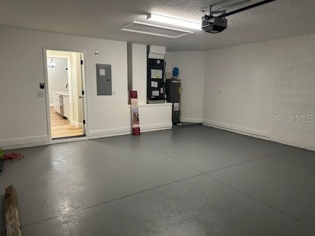 garage with water heater, baseboards, electric panel, heating unit, and a garage door opener