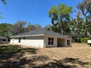 view of property exterior with stucco siding