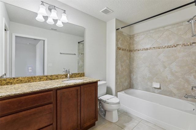 8639 Lower Villagewalk Cir, Orlando, FL 32827 - full bathroom featuring toilet, tile patterned flooring, tub / shower combination, vanity, and a textured ceiling