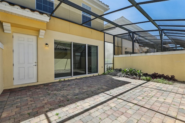 8639 Lower Villagewalk Cir, Orlando, FL 32827 - view of patio / terrace featuring a lanai