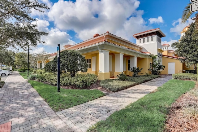 8639 Lower Villagewalk Cir, Orlando, FL 32827 - view of front of house featuring stucco siding