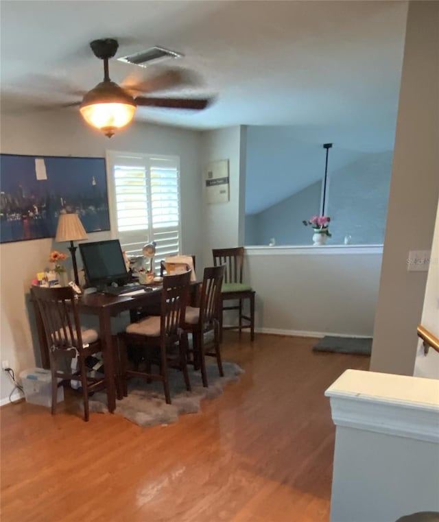 12706 Magnolia Bay Blvd, Clermont, FL 34711 - dining space with wood finished floors and a ceiling fan