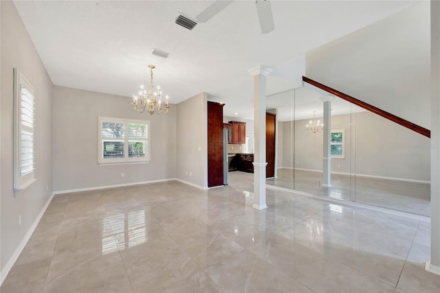 12706 Magnolia Bay Blvd, Clermont, FL 34711 - unfurnished living room featuring a chandelier, a ceiling fan, light marble finish flooring, and decorative columns