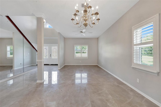 12706 Magnolia Bay Blvd, Clermont, FL 34711 - unfurnished living room with a chandelier, a ceiling fan, and lofted ceiling