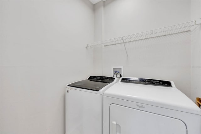 12706 Magnolia Bay Blvd, Clermont, FL 34711 - laundry room featuring independent washer and dryer