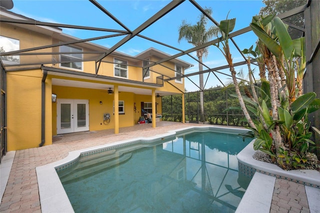12706 Magnolia Bay Blvd, Clermont, FL 34711 - outdoor pool with french doors, a patio area, a ceiling fan, and glass enclosure