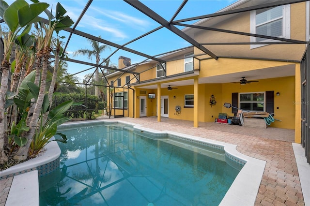 12706 Magnolia Bay Blvd, Clermont, FL 34711 - outdoor pool with a ceiling fan, a patio, and a lanai