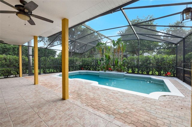 12706 Magnolia Bay Blvd, Clermont, FL 34711 - outdoor pool featuring a patio, glass enclosure, and ceiling fan