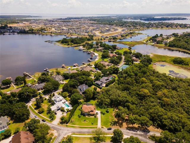 12706 Magnolia Bay Blvd, Clermont, FL 34711 - aerial view of residential area with a large body of water