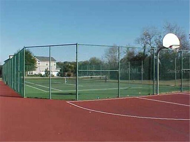 12706 Magnolia Bay Blvd, Clermont, FL 34711 - view of tennis court featuring community basketball court