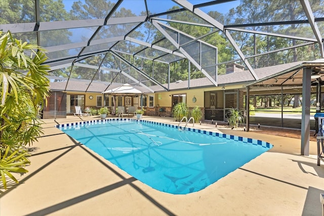 11160 SE 47th Ave, Belleview, FL 34420 - outdoor pool featuring a lanai and a patio area