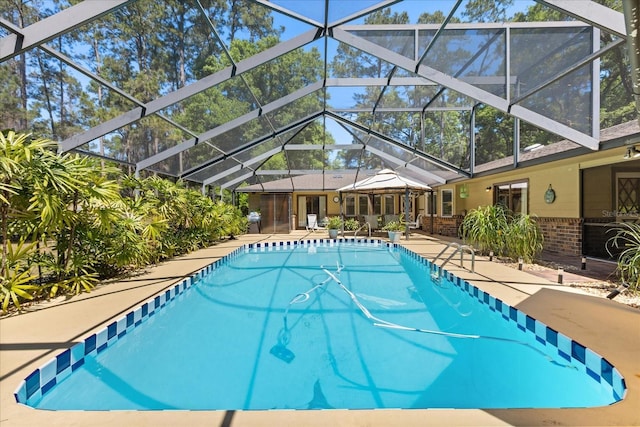 11160 SE 47th Ave, Belleview, FL 34420 - pool featuring a lanai and a patio area
