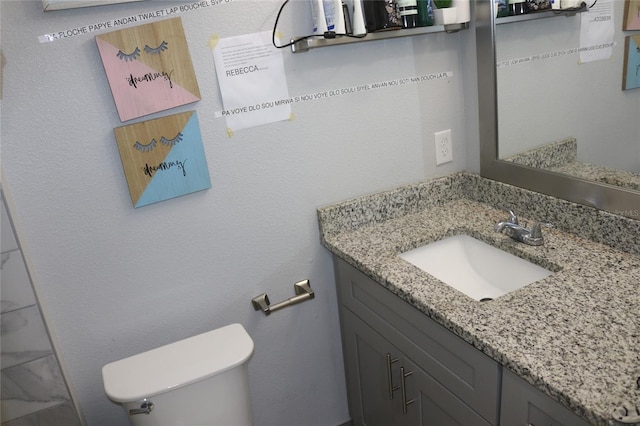319 Wilmer Ave, Orlando, FL 32811 - bathroom featuring vanity and toilet