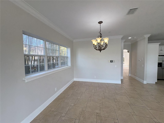 unfurnished dining area featuring crown molding, arched walkways, visible vents, baseboards, and a notable chandelier
