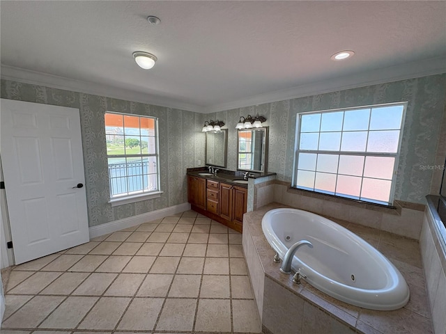 full bath with a sink, a whirlpool tub, double vanity, and wallpapered walls