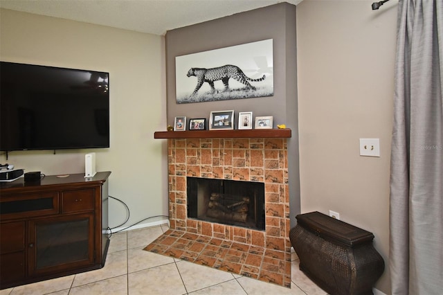tiled living area featuring a fireplace with flush hearth