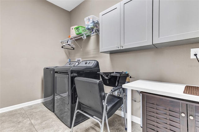 2724 Westyn Cove Ln, Ocoee, FL 34761 - laundry room with cabinet space, washer and clothes dryer, and baseboards