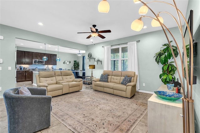 2724 Westyn Cove Ln, Ocoee, FL 34761 - living area featuring a ceiling fan, recessed lighting, and baseboards