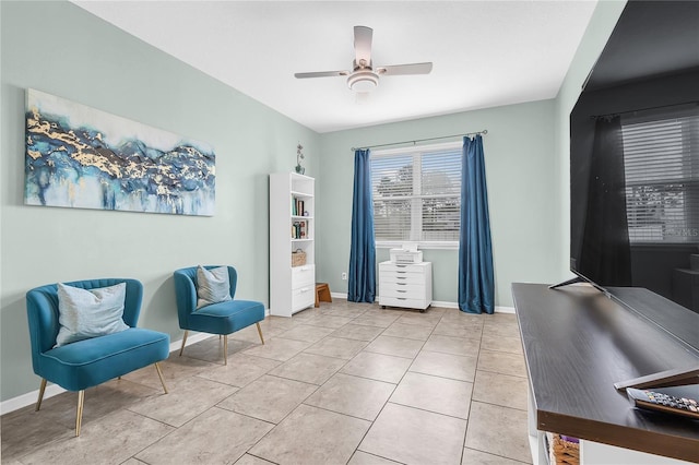 2724 Westyn Cove Ln, Ocoee, FL 34761 - living area featuring a ceiling fan, baseboards, and light tile patterned flooring