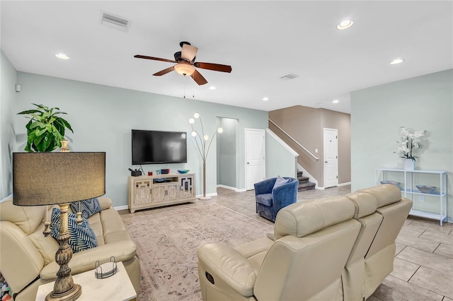 2724 Westyn Cove Ln, Ocoee, FL 34761 - living area with a ceiling fan, stairs, recessed lighting, baseboards, and light tile patterned flooring