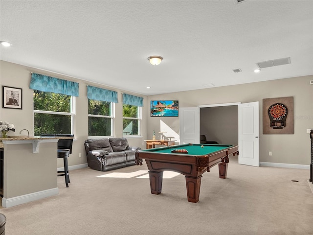 game room featuring baseboards, visible vents, pool table, and light colored carpet