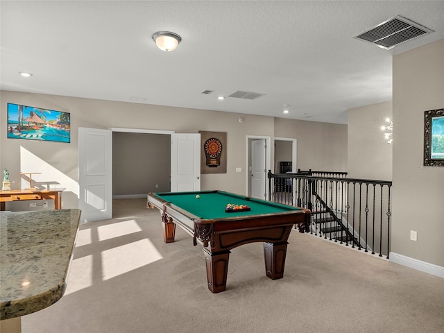 game room featuring baseboards, visible vents, and carpet