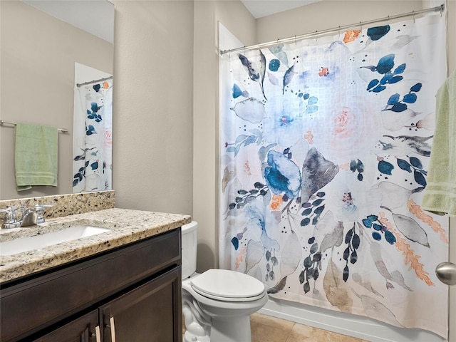 bathroom with a shower with curtain, tile patterned flooring, vanity, and toilet