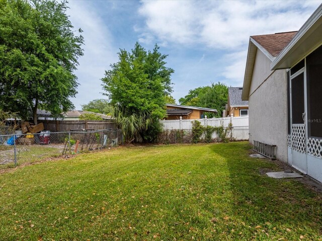 3830 Spring Breeze Dr, Orlando, FL 32829 - view of yard featuring a fenced backyard