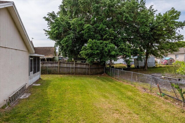 3830 Spring Breeze Dr, Orlando, FL 32829 - view of yard with fence