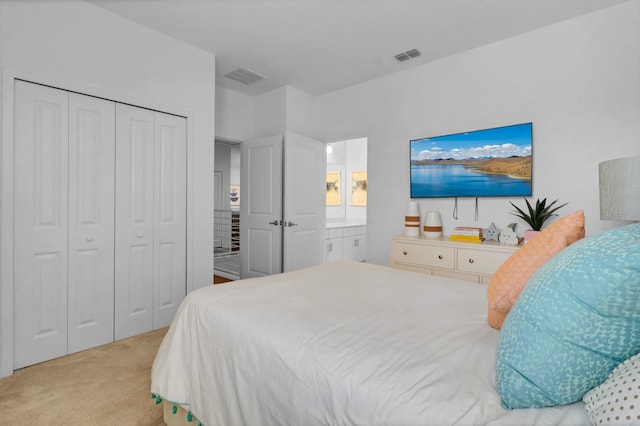 bedroom featuring light carpet, visible vents, and a closet