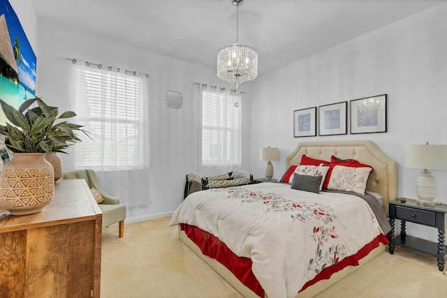 bedroom featuring an inviting chandelier, carpet floors, and baseboards