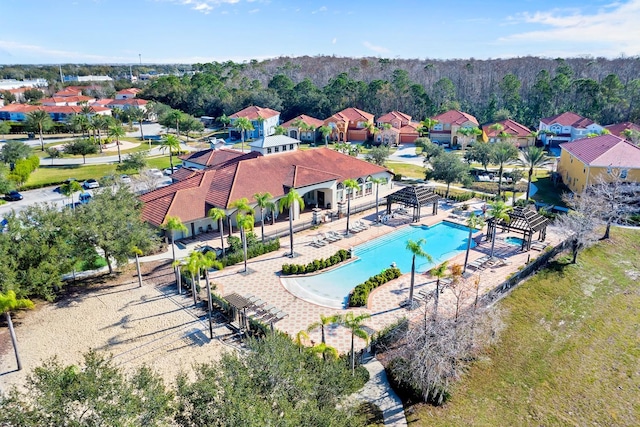 birds eye view of property with a residential view