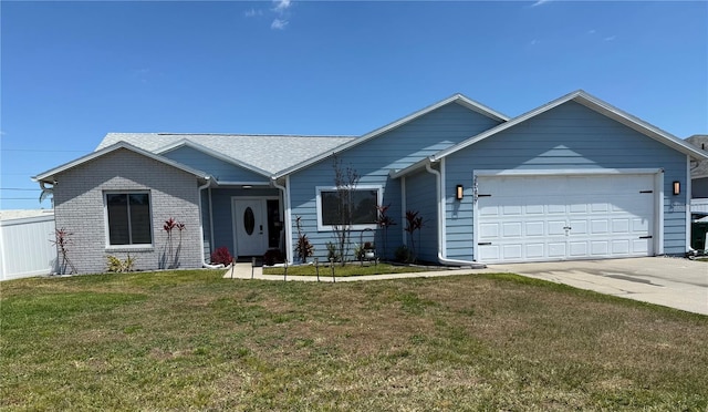ranch-style home featuring fence, a garage, a front yard, and driveway