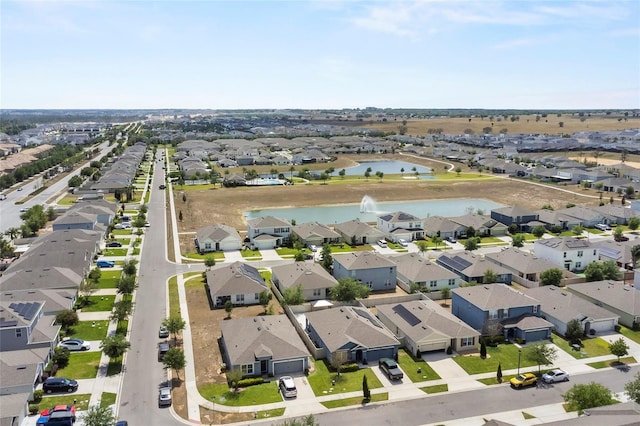 9005 Tuscan Cypress St, Kissimmee, FL 34747 - aerial view of residential area with a large body of water