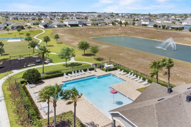 9005 Tuscan Cypress St, Kissimmee, FL 34747 - community pool featuring a residential view and a water view