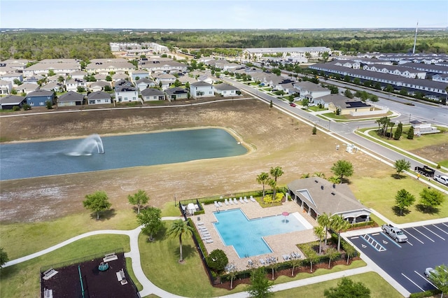 9005 Tuscan Cypress St, Kissimmee, FL 34747 - aerial view of a nearby body of water and a pool area