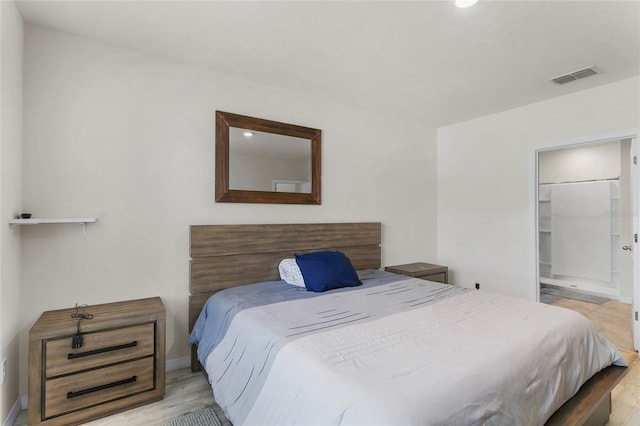 9005 Tuscan Cypress St, Kissimmee, FL 34747 - bedroom featuring wood finished floors and baseboards