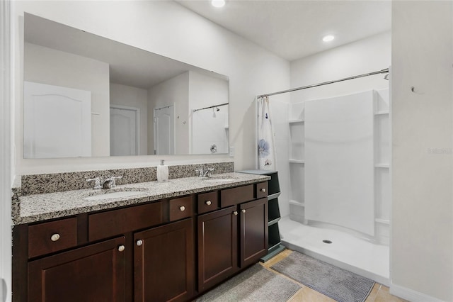 9005 Tuscan Cypress St, Kissimmee, FL 34747 - full bathroom with curtained shower, double vanity, and tile patterned floors